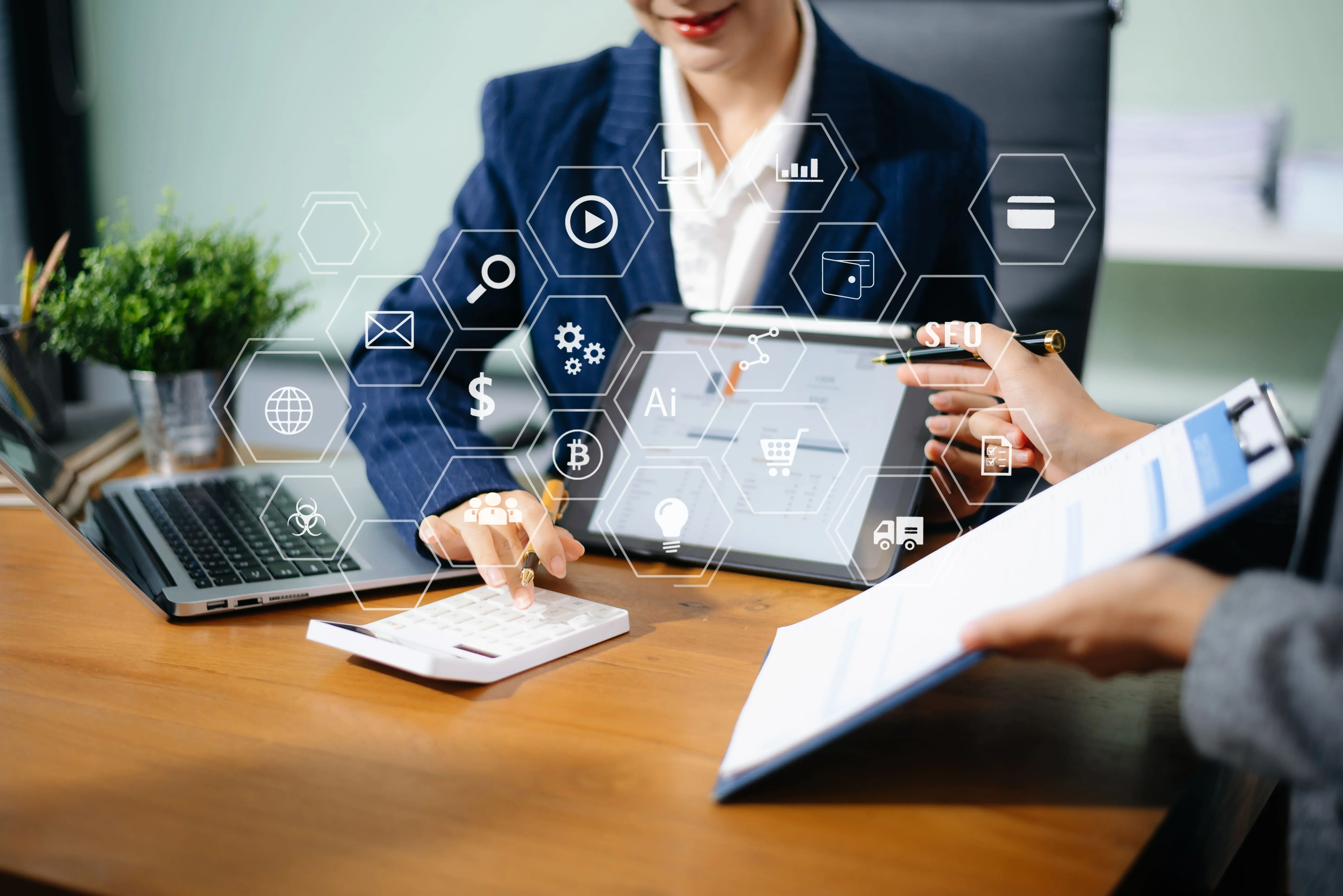 Business team reviewing AI systems and analytics at a desk
